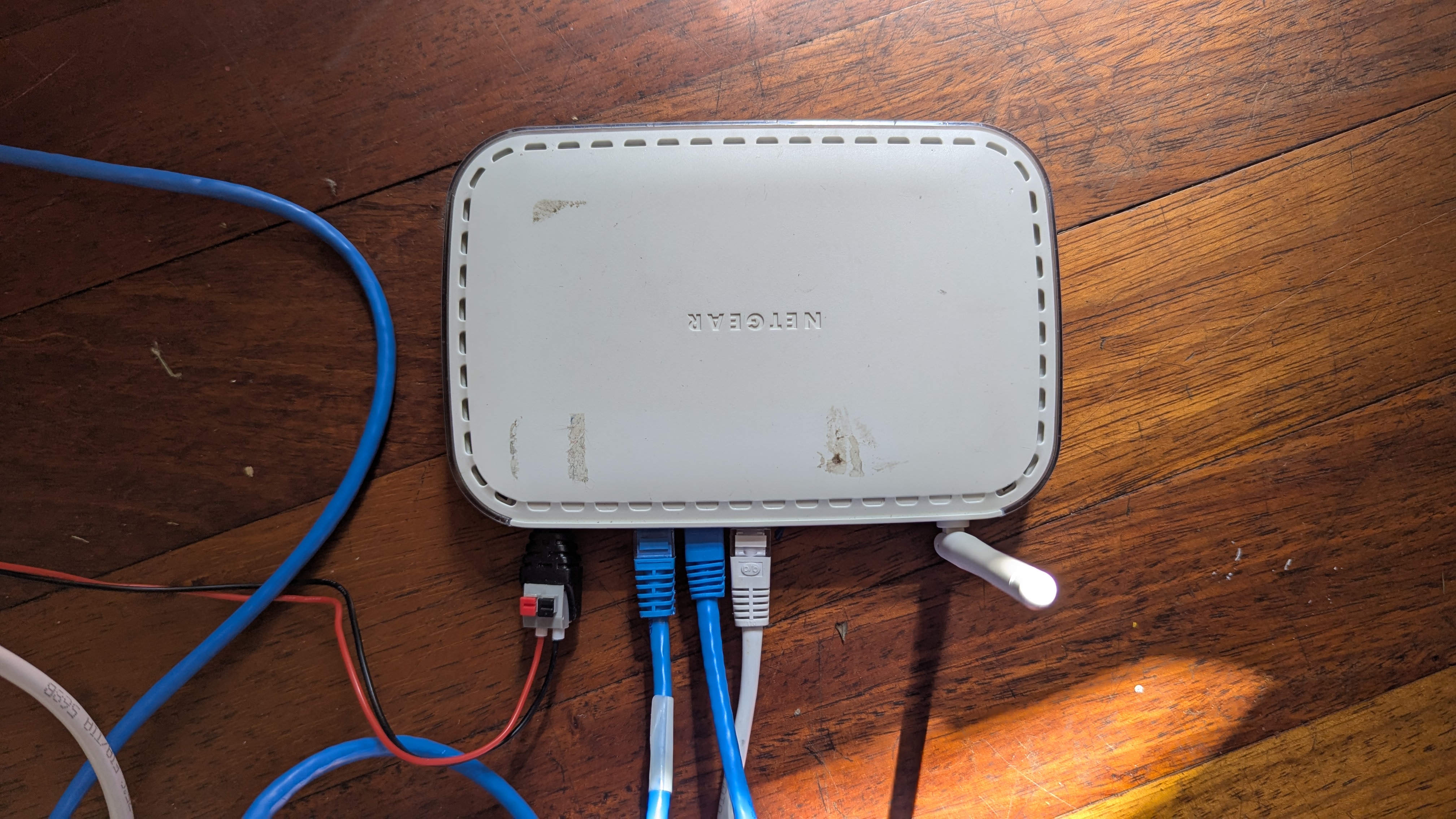 Old router used to network the laptop and Raspberry Pi